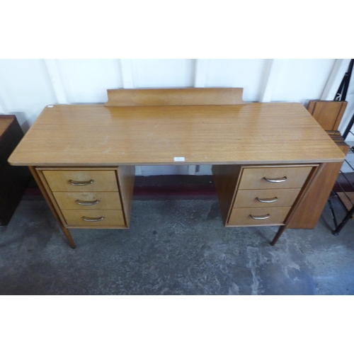 67 - A teak desk