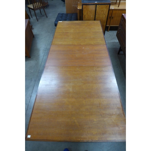 79 - An Archie Shine teak extending dining table, designed by Robert Heritage