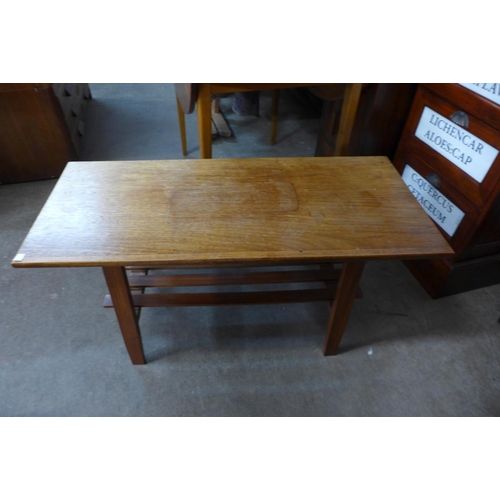 99 - A teak coffee table and a teak drop leaf table