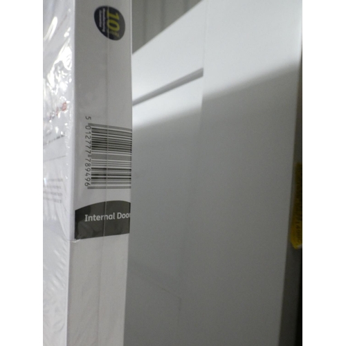 3004 - Two white primed four panel internal doors - 1981 x 838 x 35mm * this lot is subject to VAT