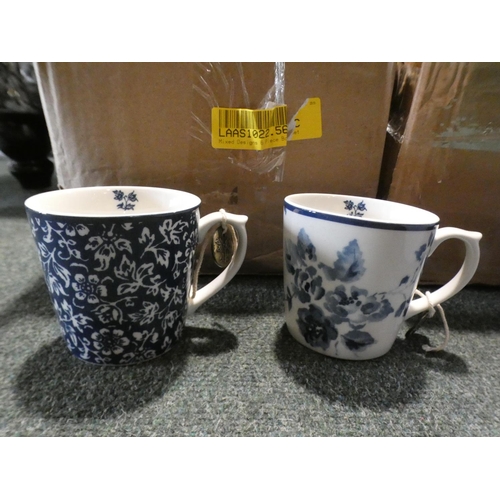 3010 - Melamine serving bowl and six mixed design bone china mugs * this lot is subject to VAT