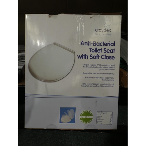 3019 - Soft close toilet seat and novelty water dispenser and a pair of polished brass door handles * this ... 