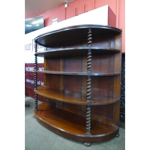 38 - A Victorian mahogany demi lune barleytwist open bookcase