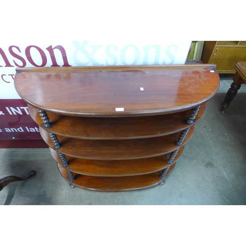 38 - A Victorian mahogany demi lune barleytwist open bookcase