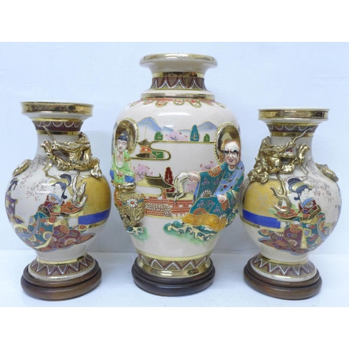 602 - Three Japanese vases on stands, (2+1), tallest 31cm