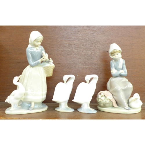 606 - Four Lladro figurines, 'Ducks Seller' (1267), designer Juan Huerta, designed 1974, retired 1994, 20c... 