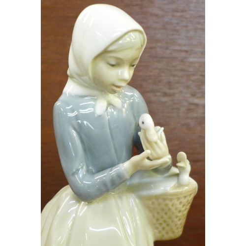 606 - Four Lladro figurines, 'Ducks Seller' (1267), designer Juan Huerta, designed 1974, retired 1994, 20c... 