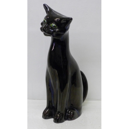 612 - A large Brannam of Barnstable cat, 43cm