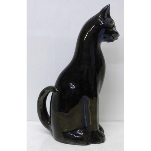 612 - A large Brannam of Barnstable cat, 43cm