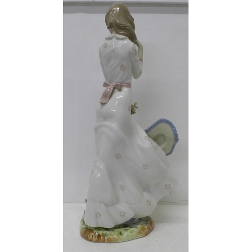 613 - A Zaphir Spanish figure of a girl with parasol, 41cm