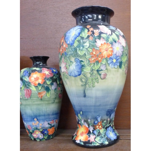 615 - Two Old Tupton ware tube lined vases and a pitcher