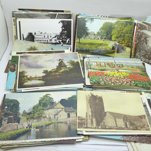 638 - A collection of postcards and photographs, etc.