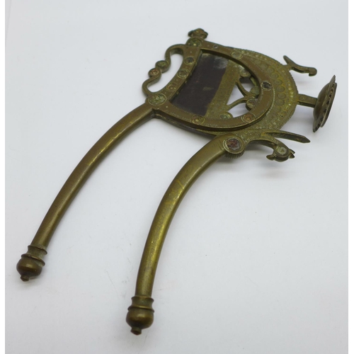 644 - A brass nut cutter