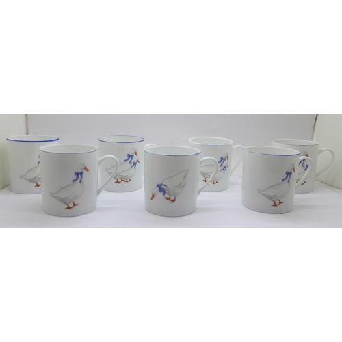 649 - Seven Limoges coffee cups, decorated with ducks