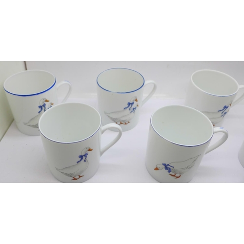 649 - Seven Limoges coffee cups, decorated with ducks