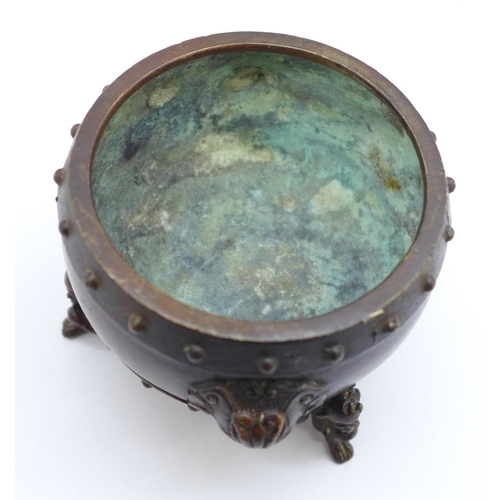 658 - A Chinese bronze censer with Apocryphal Xuande, 9cm