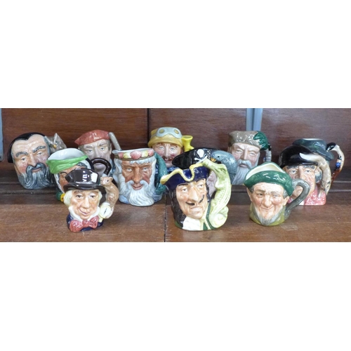 667 - Twelve small Royal Doulton character mugs