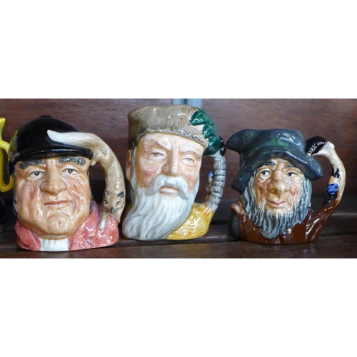 667 - Twelve small Royal Doulton character mugs