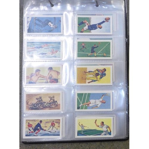 684 - An album of football trade cards and a picture card album