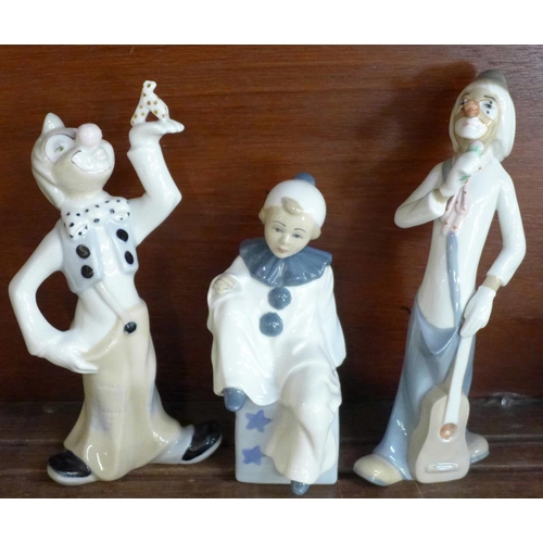 687 - Two Casades figures of clowns, A Tengia figure of a clown, Casades geese figure group and a model of... 