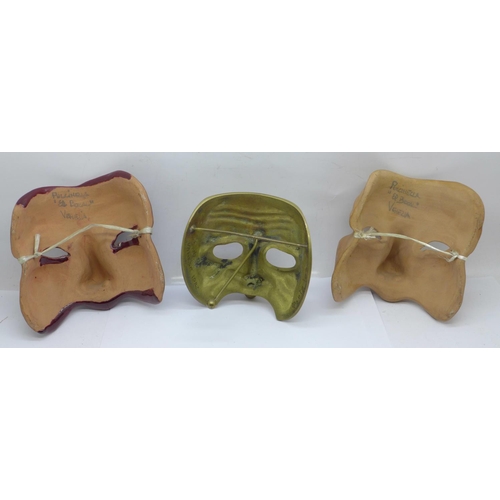 722 - Three Venetian face masks including one brass