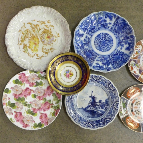 724 - A collection of plates and chargers including Aynsley, Coalport, Chinese, etc.