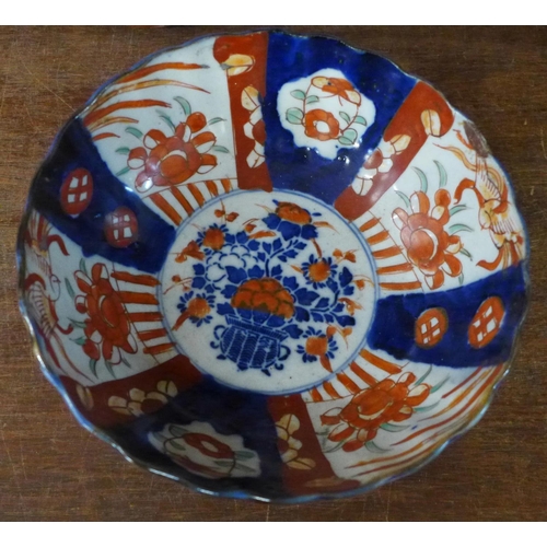 730 - A collection of Japanese Imari bowls and dishes