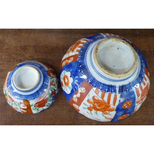 730 - A collection of Japanese Imari bowls and dishes