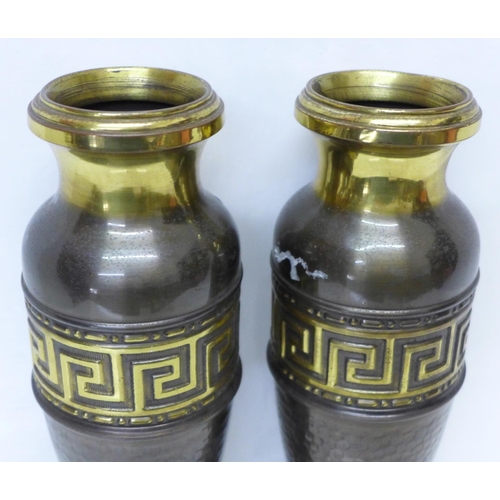 736 - Two brass vases, a/f