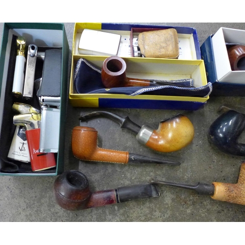 741 - Thirteen pipes including Parker of London and a box of ten lighters including Zippo