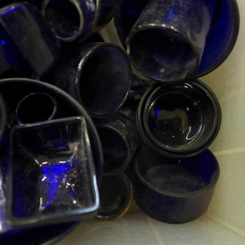 771 - A box of blue glass liners etc.