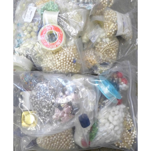 775 - Two bags of beads for re-threading