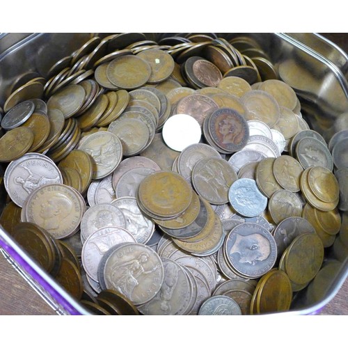 683 - Coins including a Sir Winston Churchill silver coin, three coin folders, partially complete and a ti... 