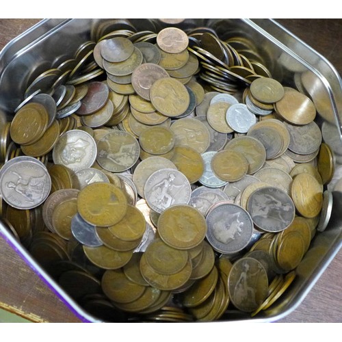 683 - Coins including a Sir Winston Churchill silver coin, three coin folders, partially complete and a ti... 