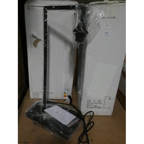 3022 - A pair of black table lamps * this lot is subject to VAT