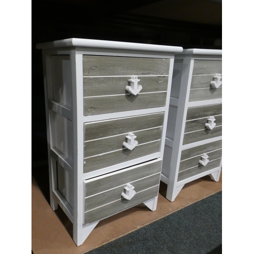 3025 - A pair of white painted three drawer bedside chests * this lot is subject to VAT