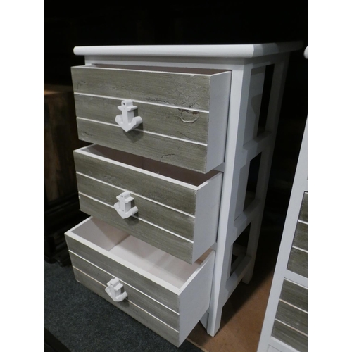 3025 - A pair of white painted three drawer bedside chests * this lot is subject to VAT