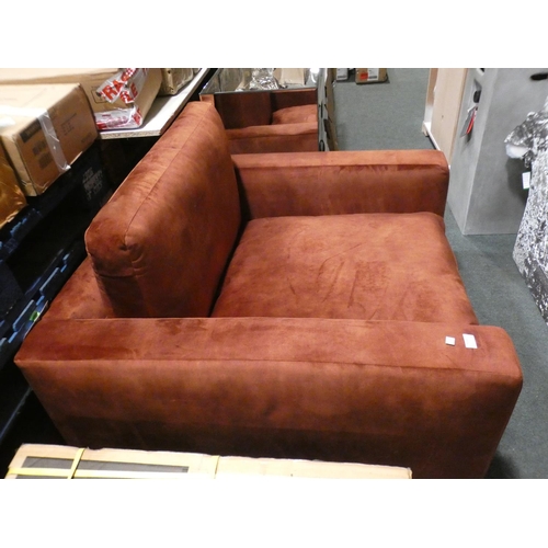 3030 - A rust velvet large armchair * this lot is subject to VAT