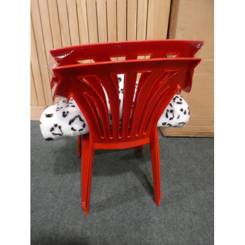 3038 - Two children's red plastic chairs and a snow leopard rug * this lot is subject to VAT