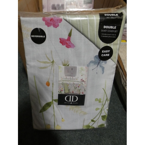 3062 - Four mixed style double duvet sets * this lot is subject to VAT