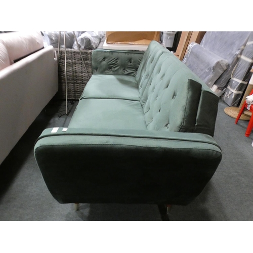 3070 - A green velvet three seater sofa with adjustable, fold down back * this lot is subject to VAT