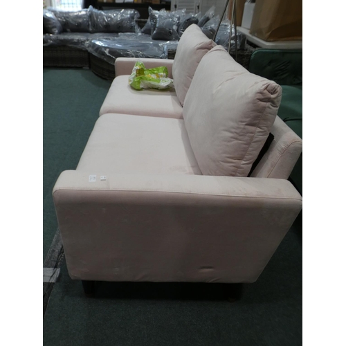 3071 - A blush pink velvet three seater sofa * this lot is subject to VAT