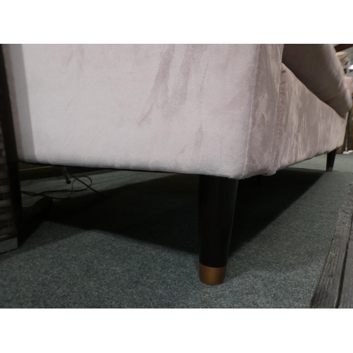 3071 - A blush pink velvet three seater sofa * this lot is subject to VAT