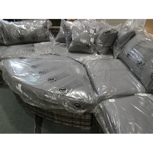 3073 - An all weather rattan large sectional corner sofa with footstool * this lot is subject to VAT