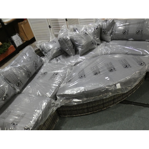 3073 - An all weather rattan large sectional corner sofa with footstool * this lot is subject to VAT