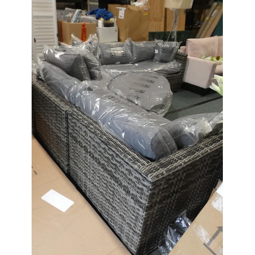 3073 - An all weather rattan large sectional corner sofa with footstool * this lot is subject to VAT