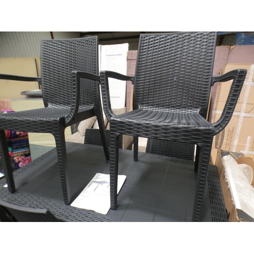 3151 - An all weather rattan table and six chairs * this lot is subject to VAT