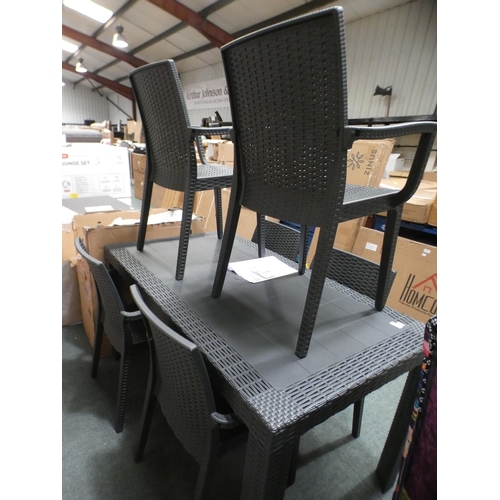 3151 - An all weather rattan table and six chairs * this lot is subject to VAT