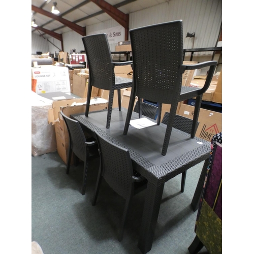 3151 - An all weather rattan table and six chairs * this lot is subject to VAT