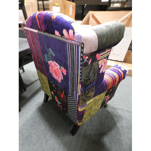 3152 - A patchwork effect floral wingback armchair * this lot is subject to VAT